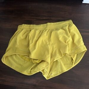 Size 8 Lululemon yellow hotty hot shorts I seem 2.5